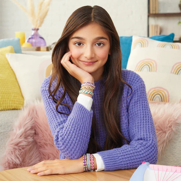 Girl wearing different friendship bracelets