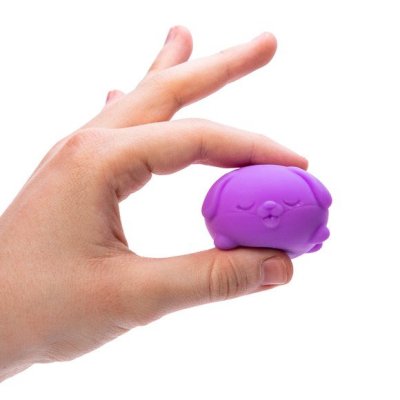 hand squishing teenie funky pup front view