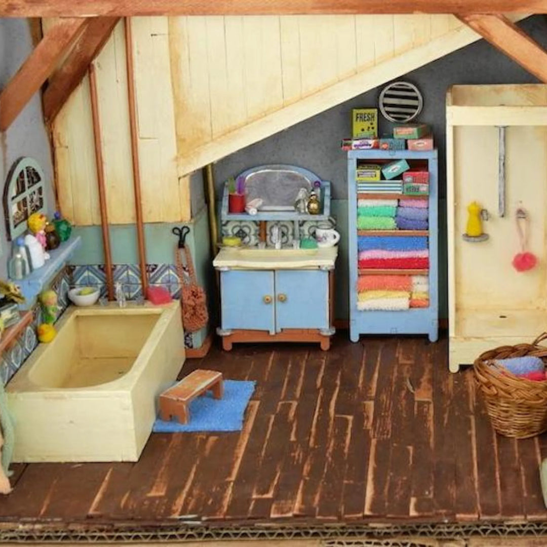 example of completed and painted bathroom furniture in cardboard bathroom