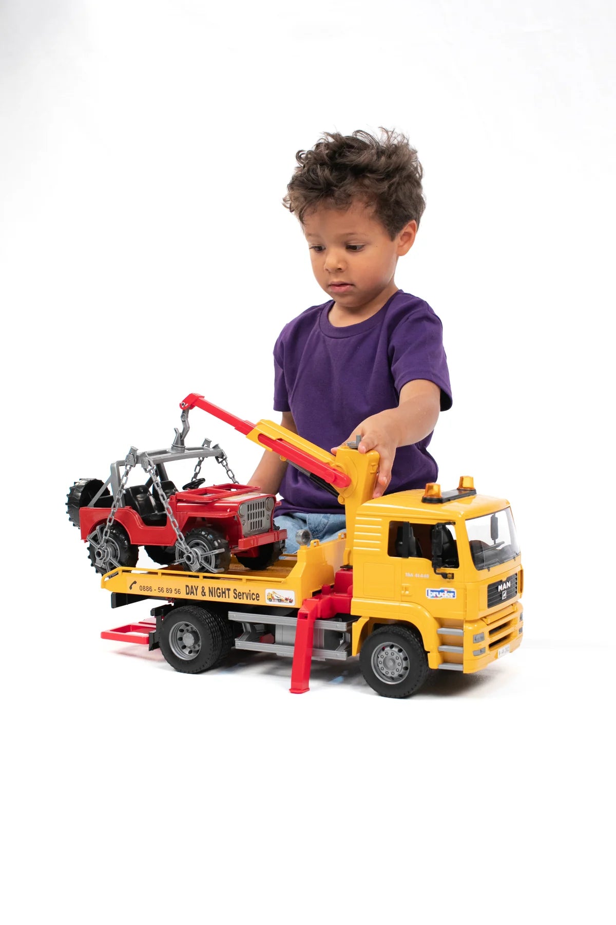 MAN TGA Tow Truck w/ Cross Country Vehicle | Bruder - LOCAL PICKUP ONLY