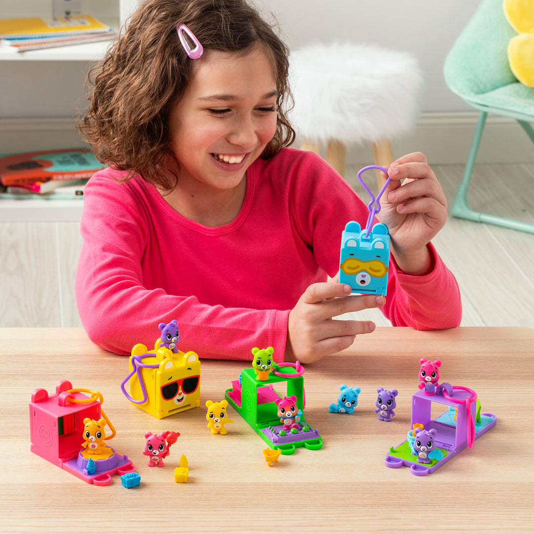 girl playing with care bear cubbies