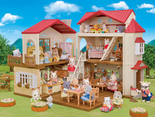 front view of open red roof country home house with various calico critters throughout the house