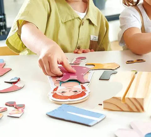 Magnetic Seasons Dress Up Wooden Puzzle | Hape