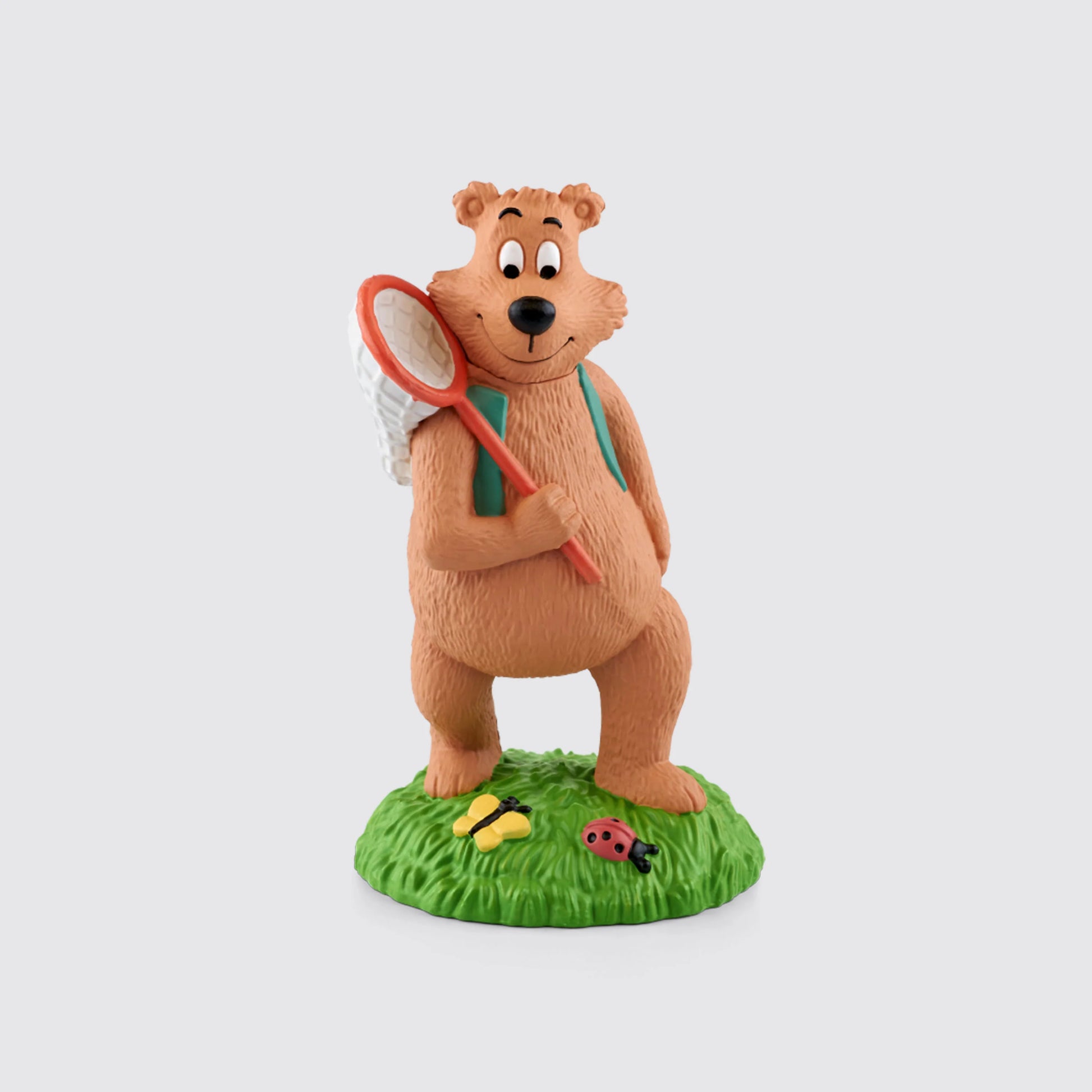 Tonie of Bear with butterfly net standing on a green patch of grass  known as the 7 habits of happy kids 