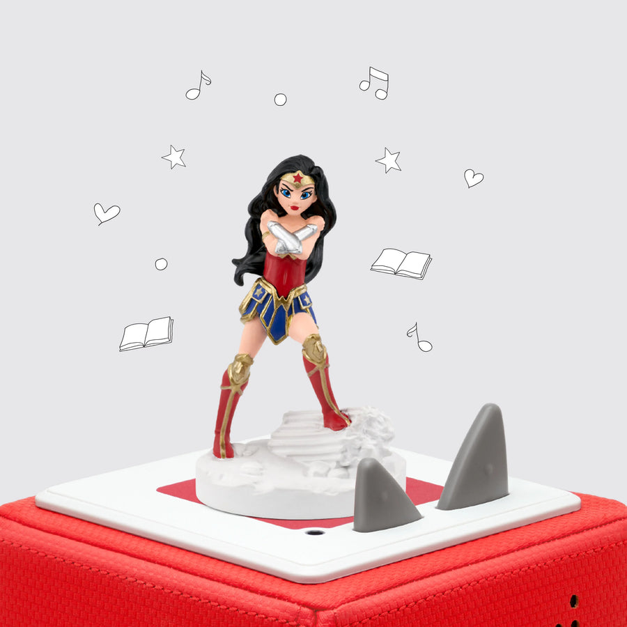 Tonie Figurine of WonderWoman with her arms crossed set on top of Toniebox