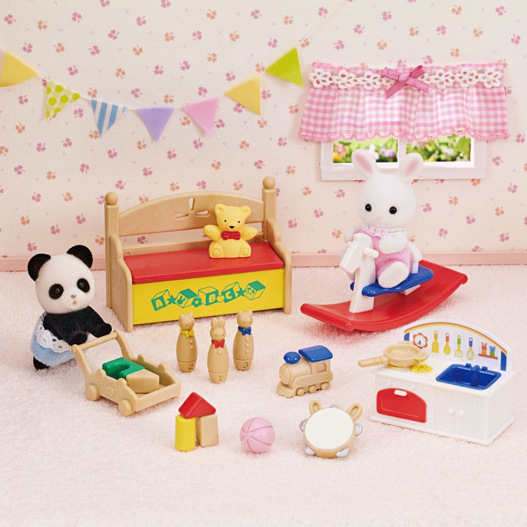 Panda and Snow Rabbit surrounded by toys in a pink room with white carpeting
