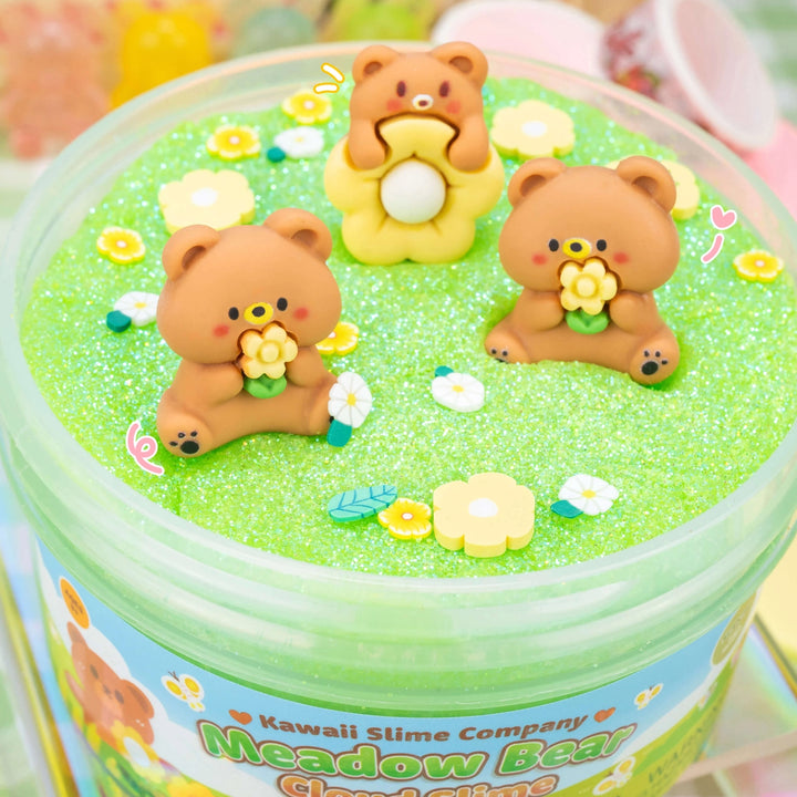 close up of bear charms sitting on top of slime