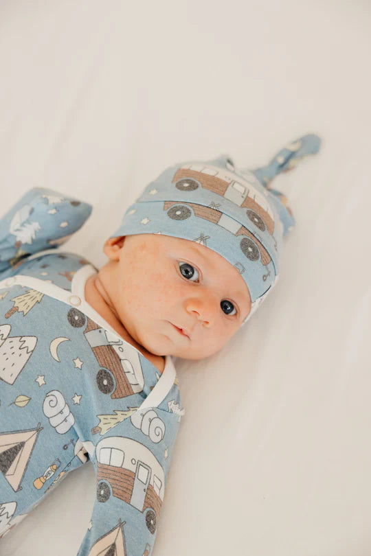 image of baby wearing hat and matching sleep sack