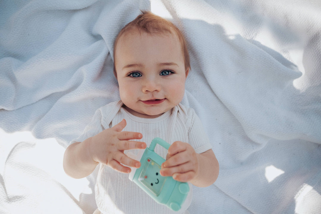 Sweetie Shake Plus™ - Teething + Rattle Toy: Sushi