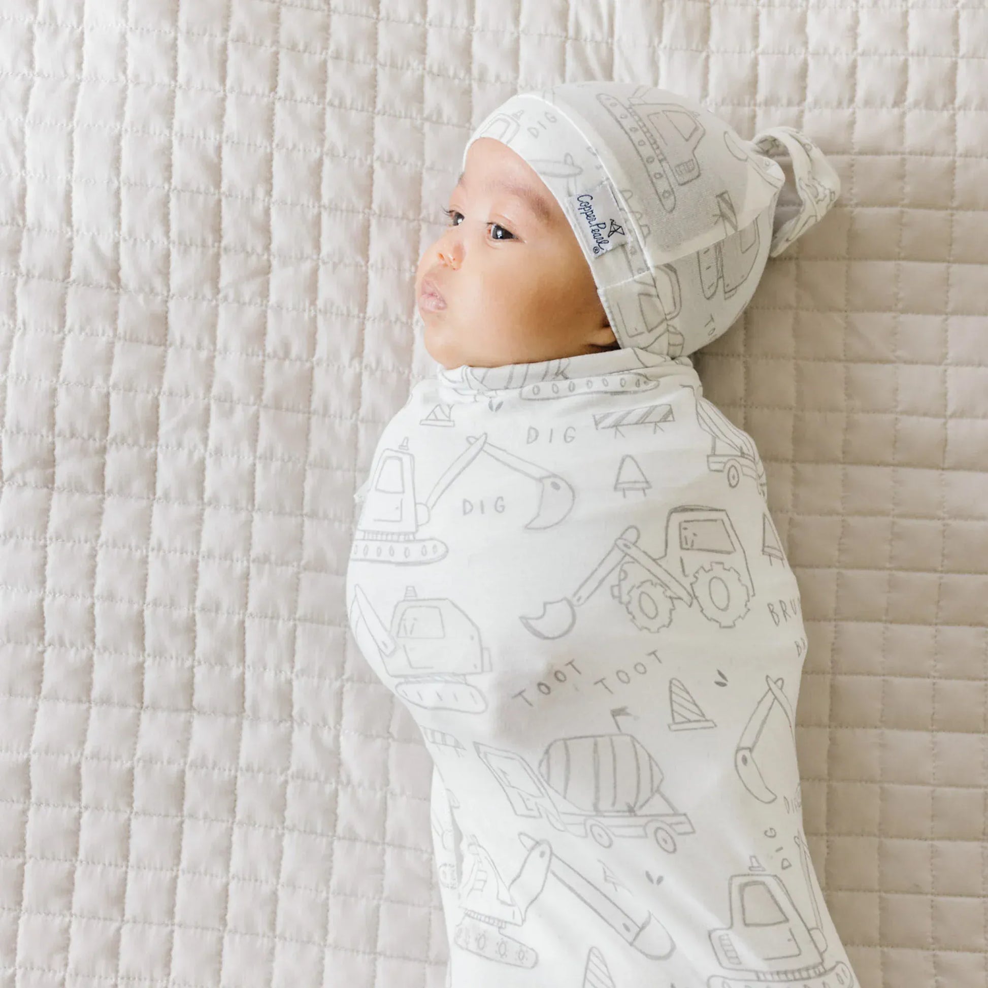 Copper Pearl Baby Gage Top Knot Hat