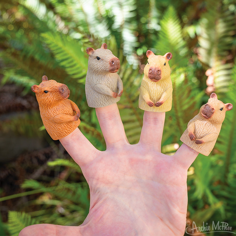 Finger Capybaras worn on fingers