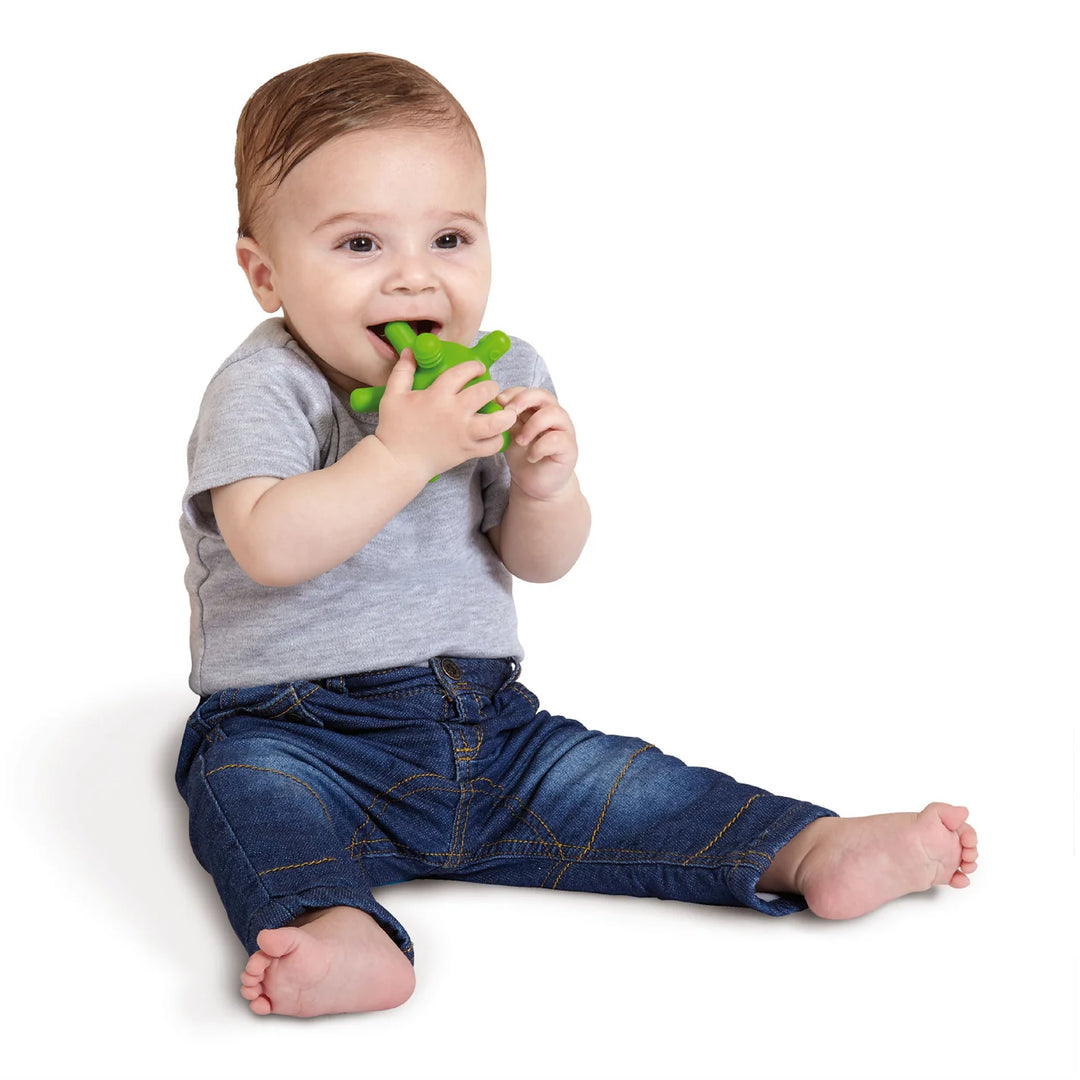 baby with green gummyball