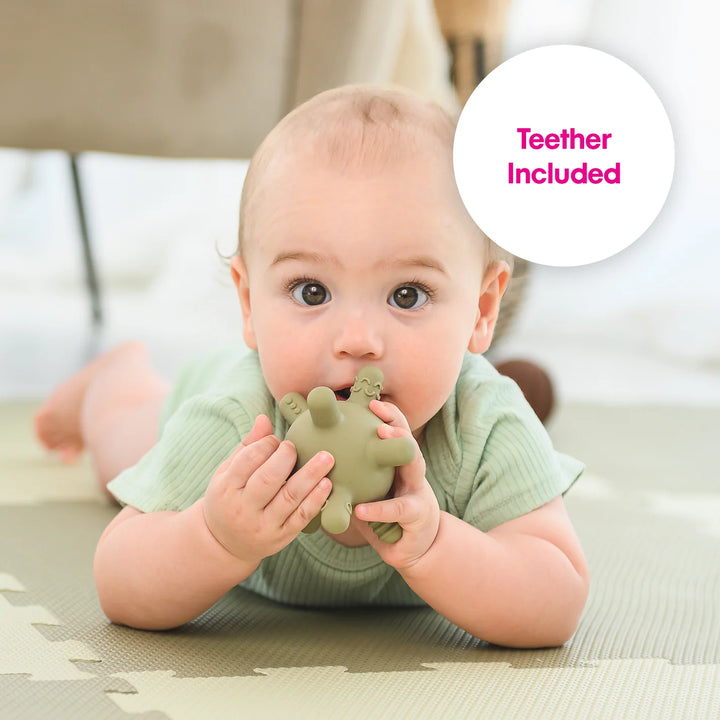 baby using teether ball