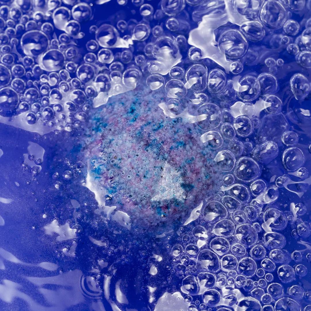purple fizzy in water
