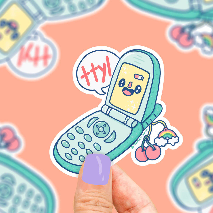 flip phone with ttyl and charm in form of vinyl sticker