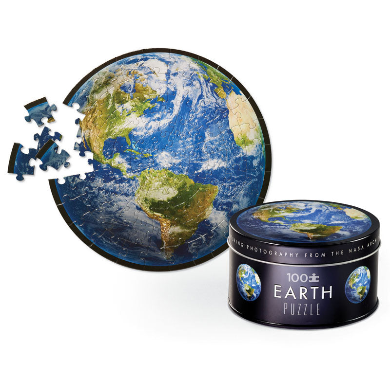 completed earth puzzle next to box