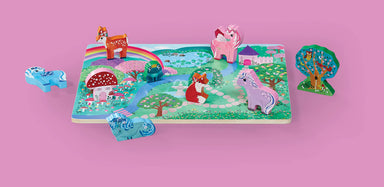 puzzle being used to play with- characters standing on their own using the puzzle board as a playmat