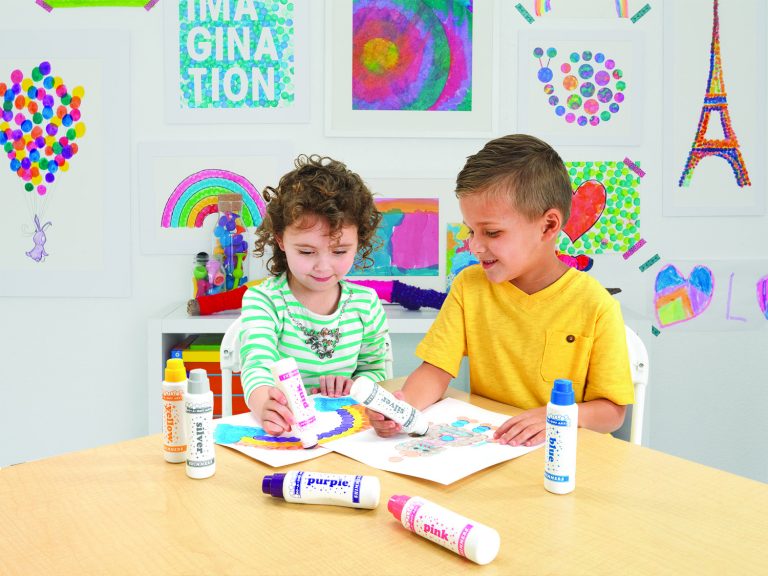 kids using do a dot pens to color on paper