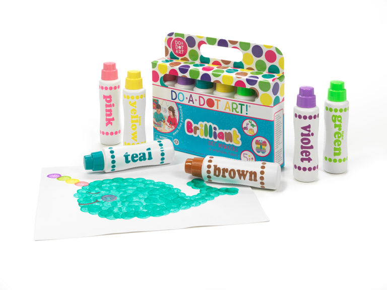 Brilliant Dot markers next to whale coloring sheet