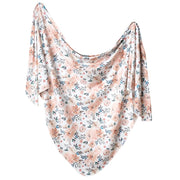 blanket spread out to show full floral pattern