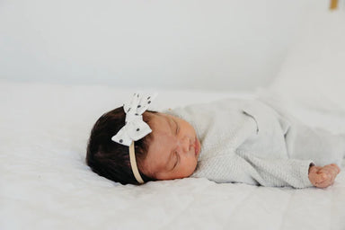 baby wearing bow