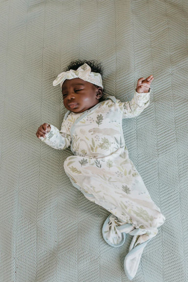 baby wearing knotted gown and matching head wrap
