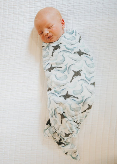 baby wrapped in blanket