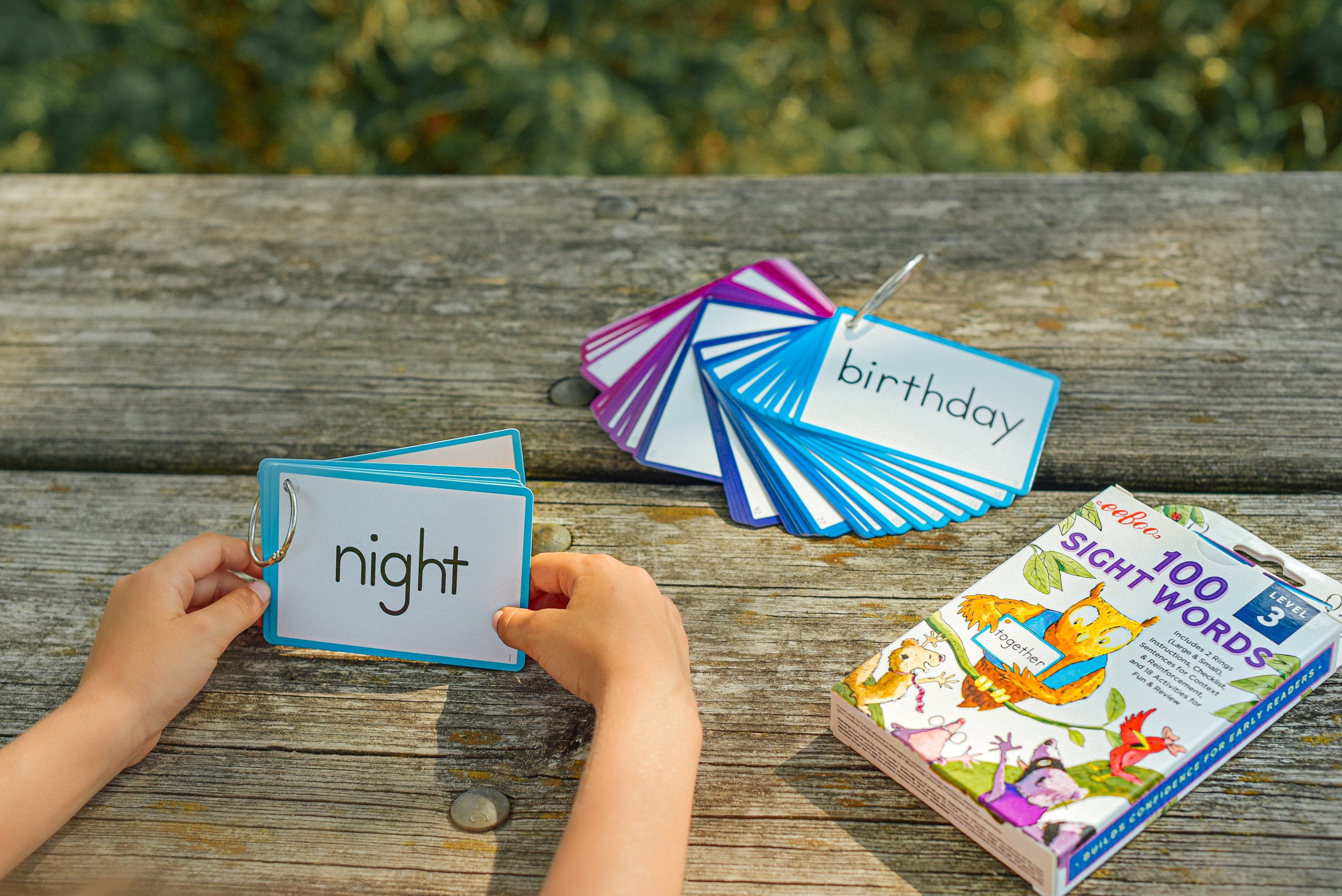 cards reading "night" and "birthday" from in the set