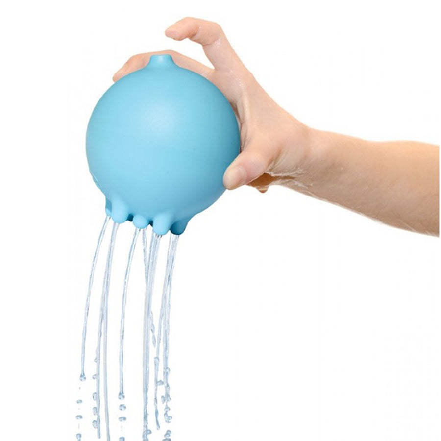 blue rainball with finger off the top hold to let water pour out of the bottom