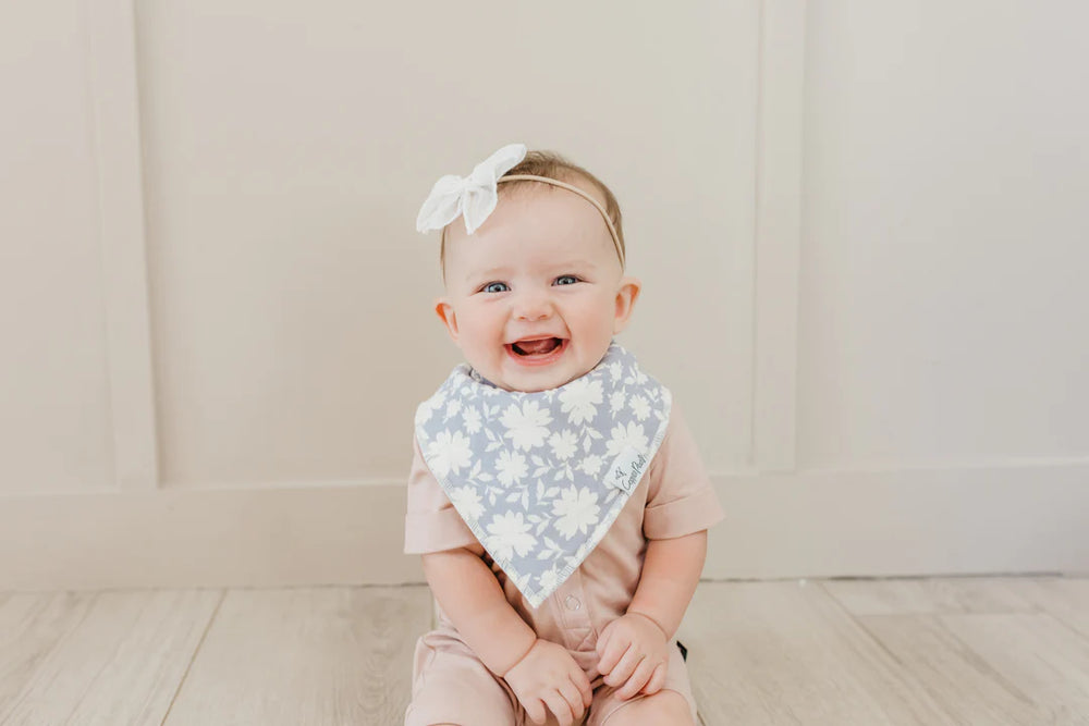 baby wearing floral bandana bib